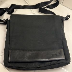 Tumi crossbody travelers bag